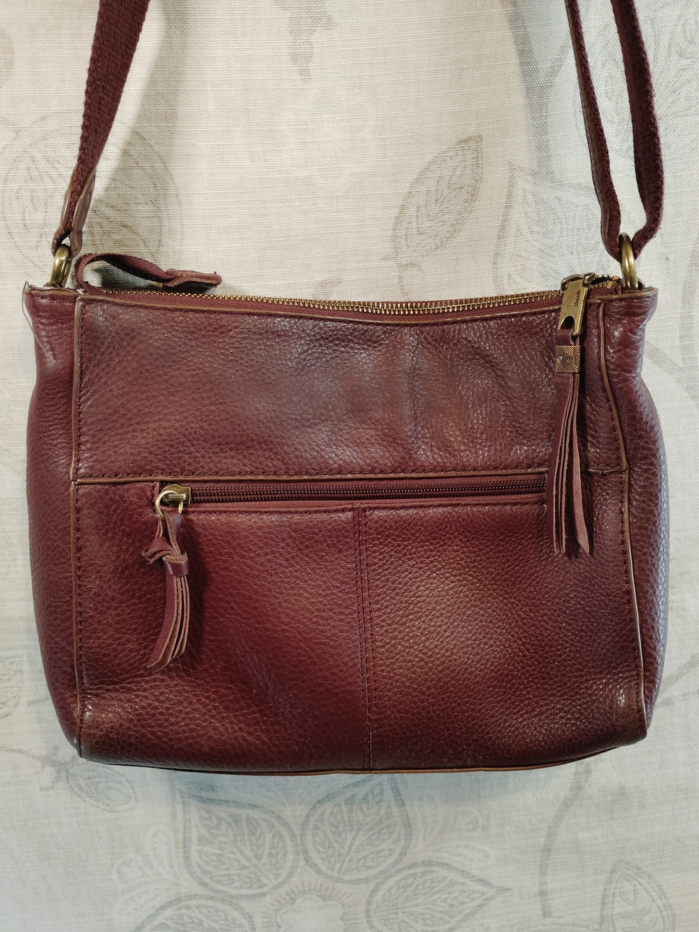 The Sak Pebbled Genuine Leather Crossbody Bag in Burgundy